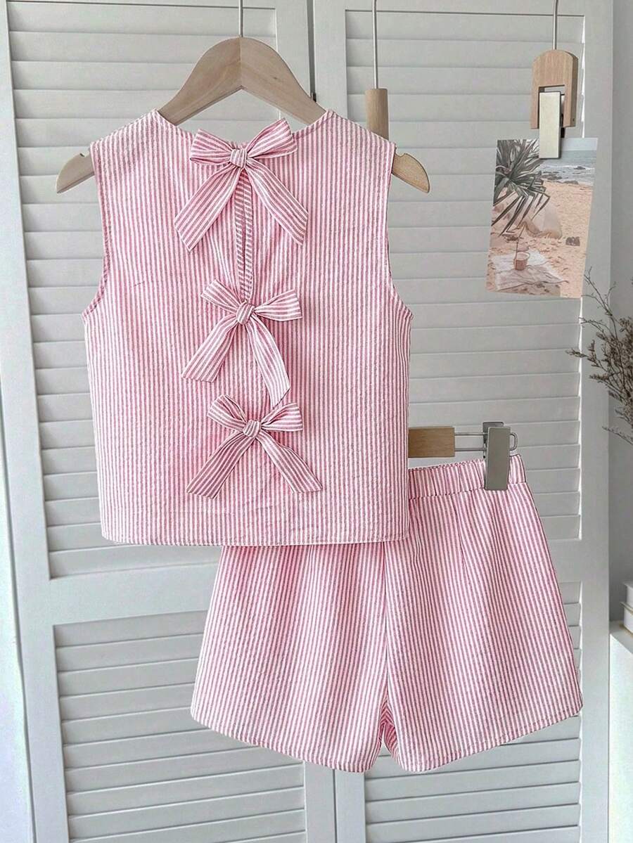 Tween girls casual blue tank top featuring round neck, textured fabric, and bow detail paired with matching shorts set.