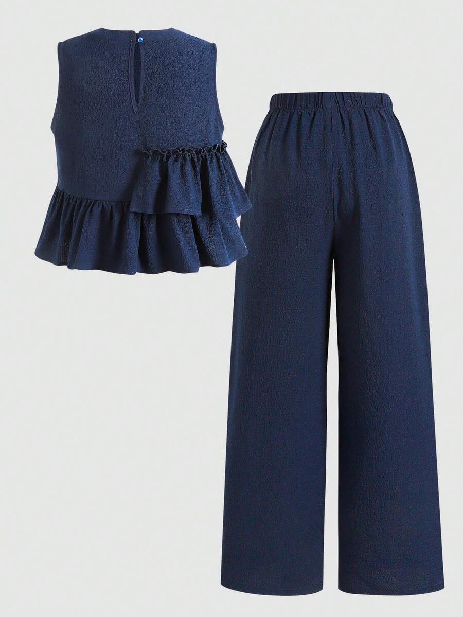 Tween girls blue striped sleeveless short top with button and ruffle details paired with matching long straight leg pants.