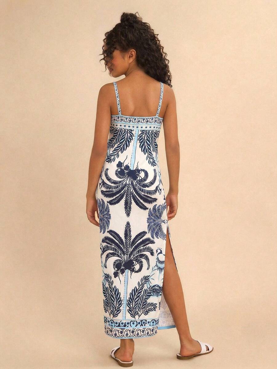 Tween girls' multicolor fruit print cami dress with spaghetti straps, sleeveless slim fit, split detail, natural waist, and long straight hem for vacation wear.