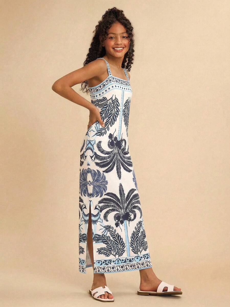 Tween girls' multicolor fruit print cami dress with spaghetti straps, sleeveless slim fit, split detail, natural waist, and long straight hem for vacation wear.