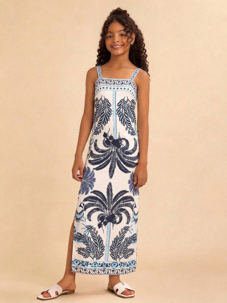 Tween girls' multicolor fruit print cami dress with spaghetti straps, sleeveless slim fit, split detail, natural waist, and long straight hem for vacation wear.