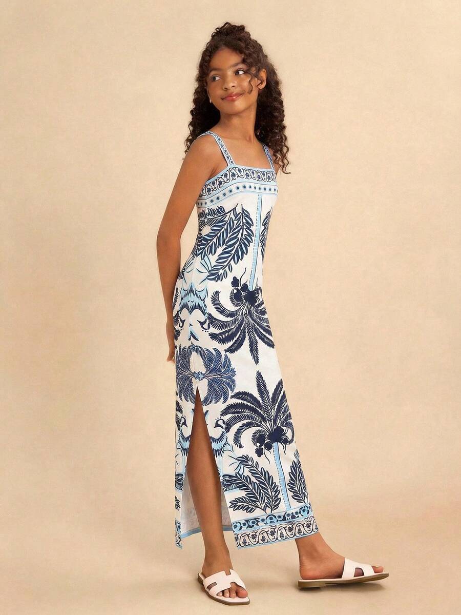 Tween girls' multicolor fruit print cami dress with spaghetti straps, sleeveless slim fit, split detail, natural waist, and long straight hem for vacation wear.