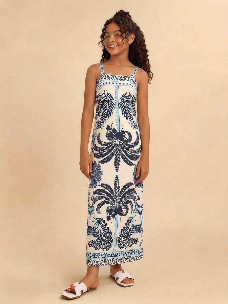 Tween girls' multicolor fruit print cami dress with spaghetti straps, sleeveless slim fit, split detail, natural waist, and long straight hem for vacation wear.
