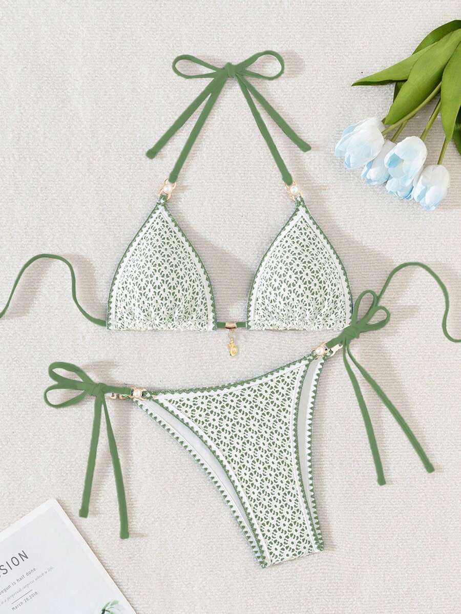 Women's triangle bikini set with contrast lace wireless bra top and ultra high waist tie side bottoms.