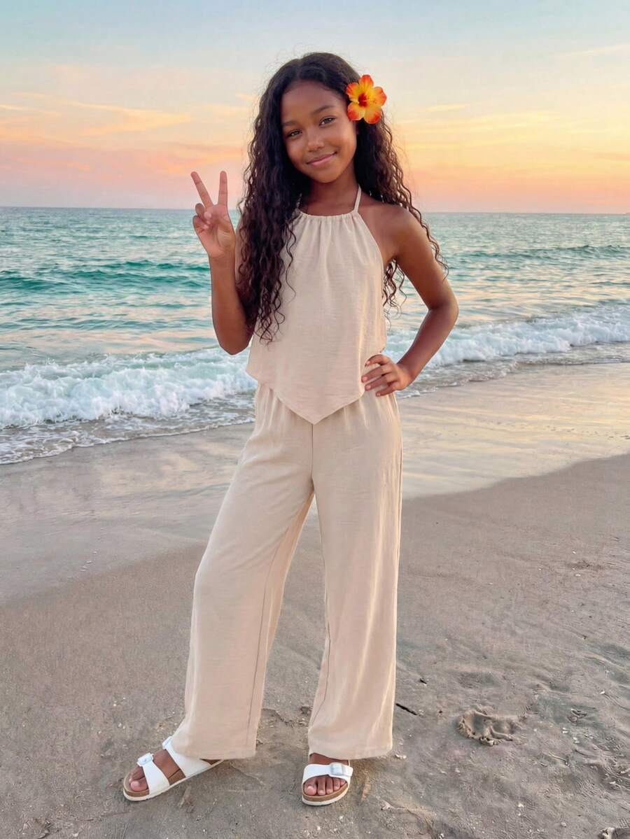 Tween girls casual apricot striped two-piece set featuring a sleeveless halter short top with curved hem and matching long pants.