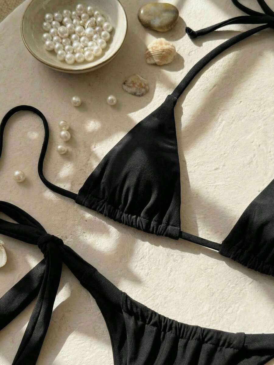 Army green high waist micro bikini swimsuit set for women featuring wireless spaghetti strap top with chain knot details and tie side thong bottoms.