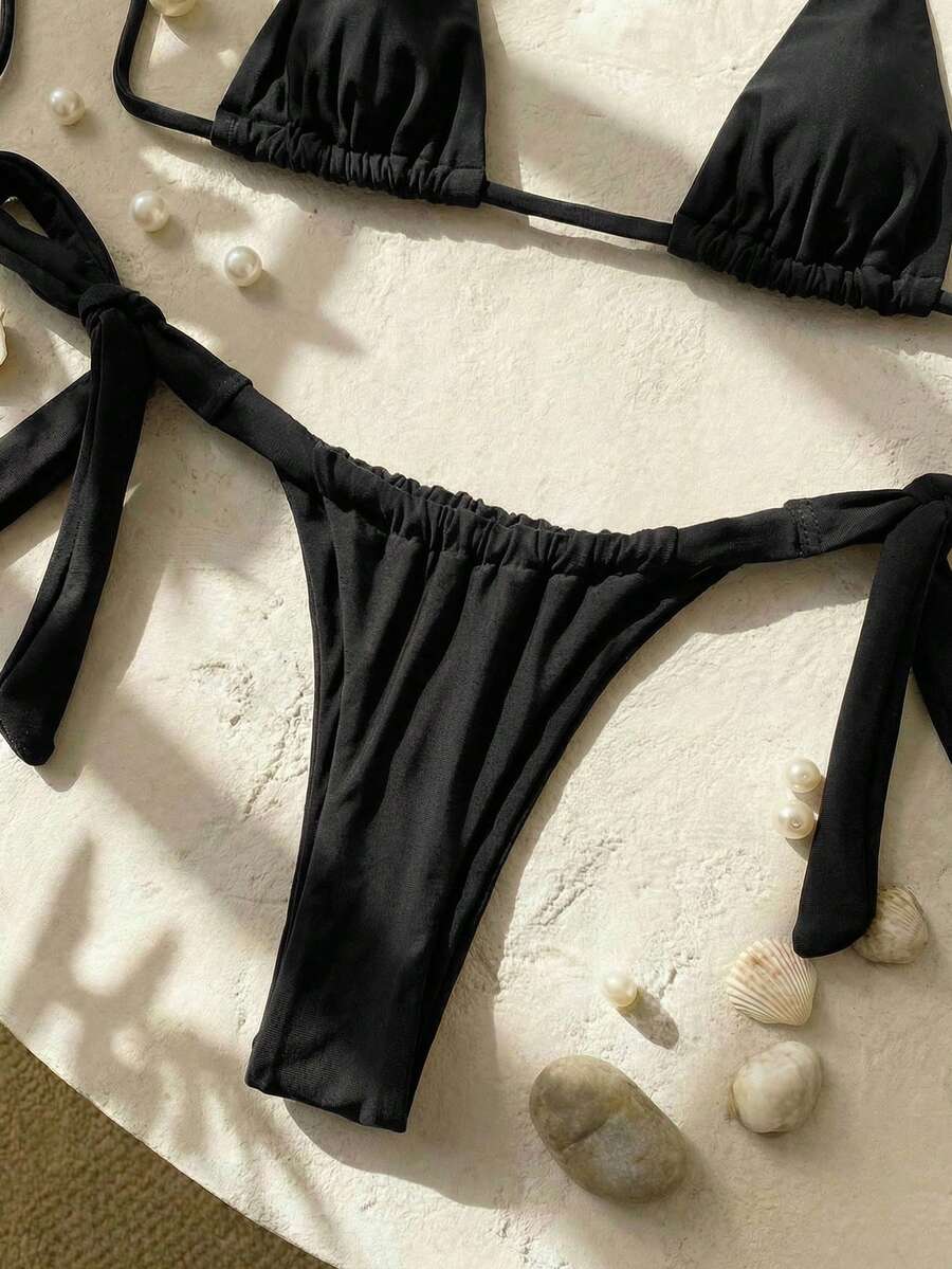 Army green high waist micro bikini swimsuit set for women featuring wireless spaghetti strap top with chain knot details and tie side thong bottoms.