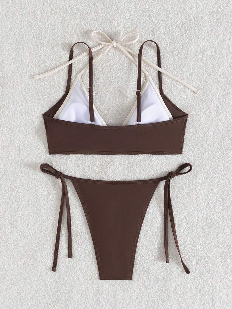 Women's color-block two-piece bikini set featuring a boho geometric pattern, tie-back halter top with removable padding, and matching tie-side bikini bottoms.