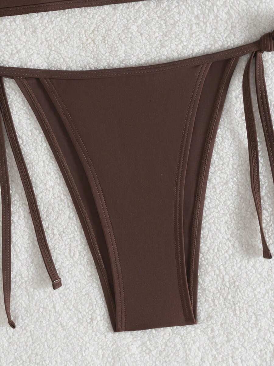 Women's color-block two-piece bikini set featuring a boho geometric pattern, tie-back halter top with removable padding, and matching tie-side bikini bottoms.