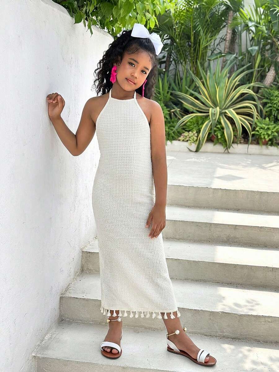 White sleeveless halter maxi dress for tween girls with slim fit, plain textured fabric, natural waist, pencil hem, and side split for summer daily wear and vacation outfits.
