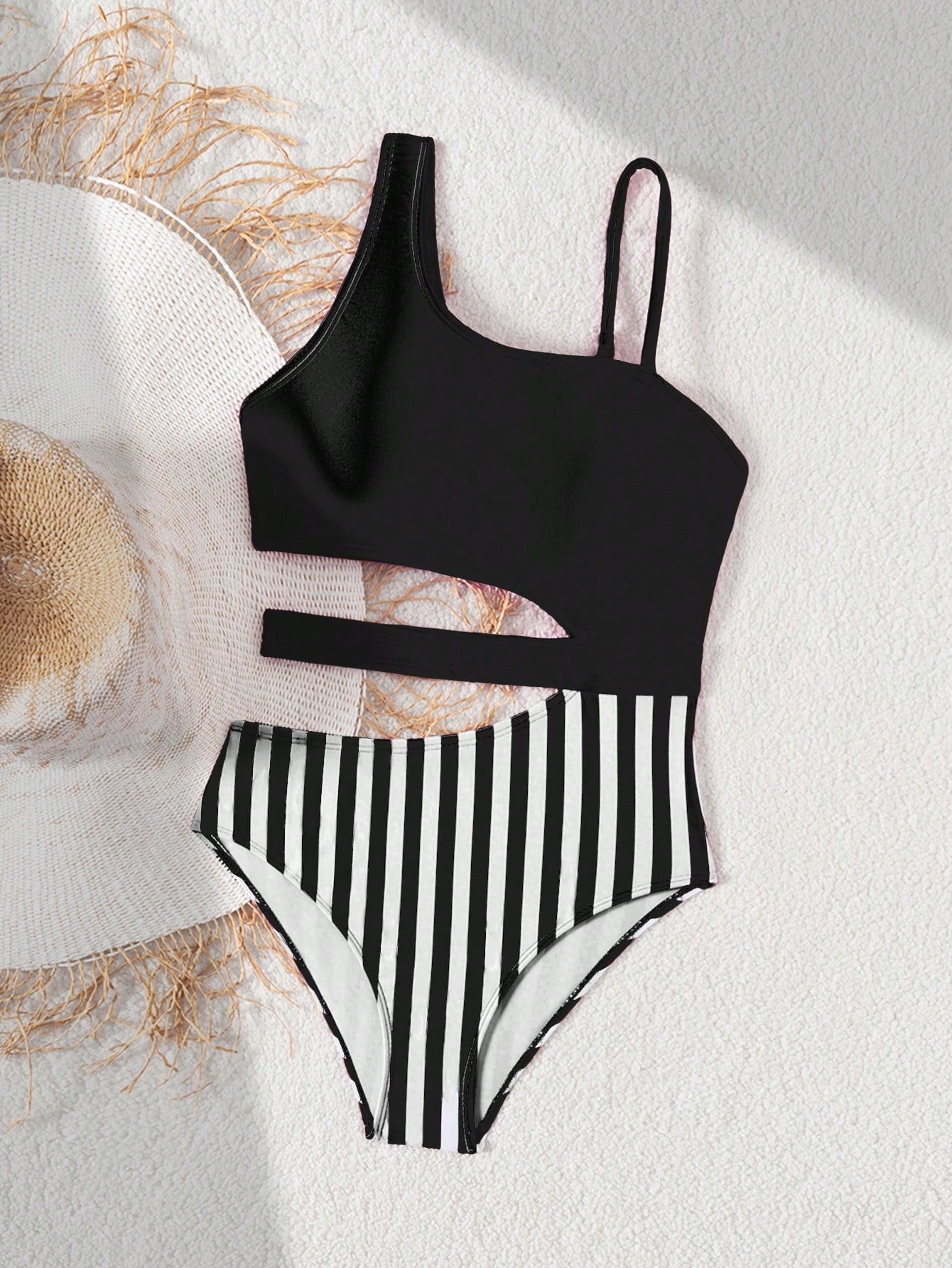 Purple tween girls one-piece swimsuit with asymmetrical neckline, cut-out waist, striped pattern, fitted silhouette, and lined body.
