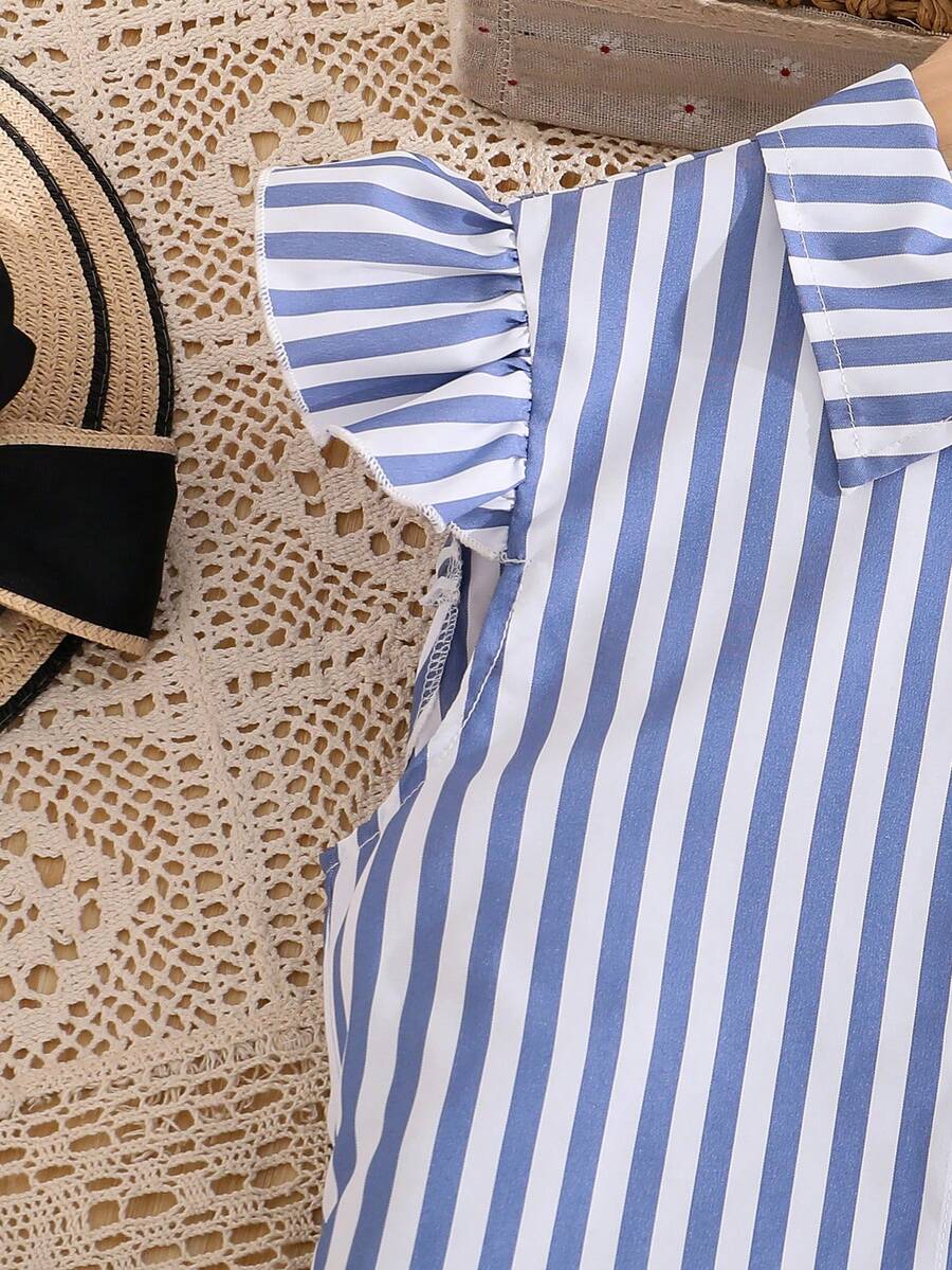 Tween girls blue and white striped casual shirt dress featuring a collared neckline, button front, and flounce sleeves by Left Mama.