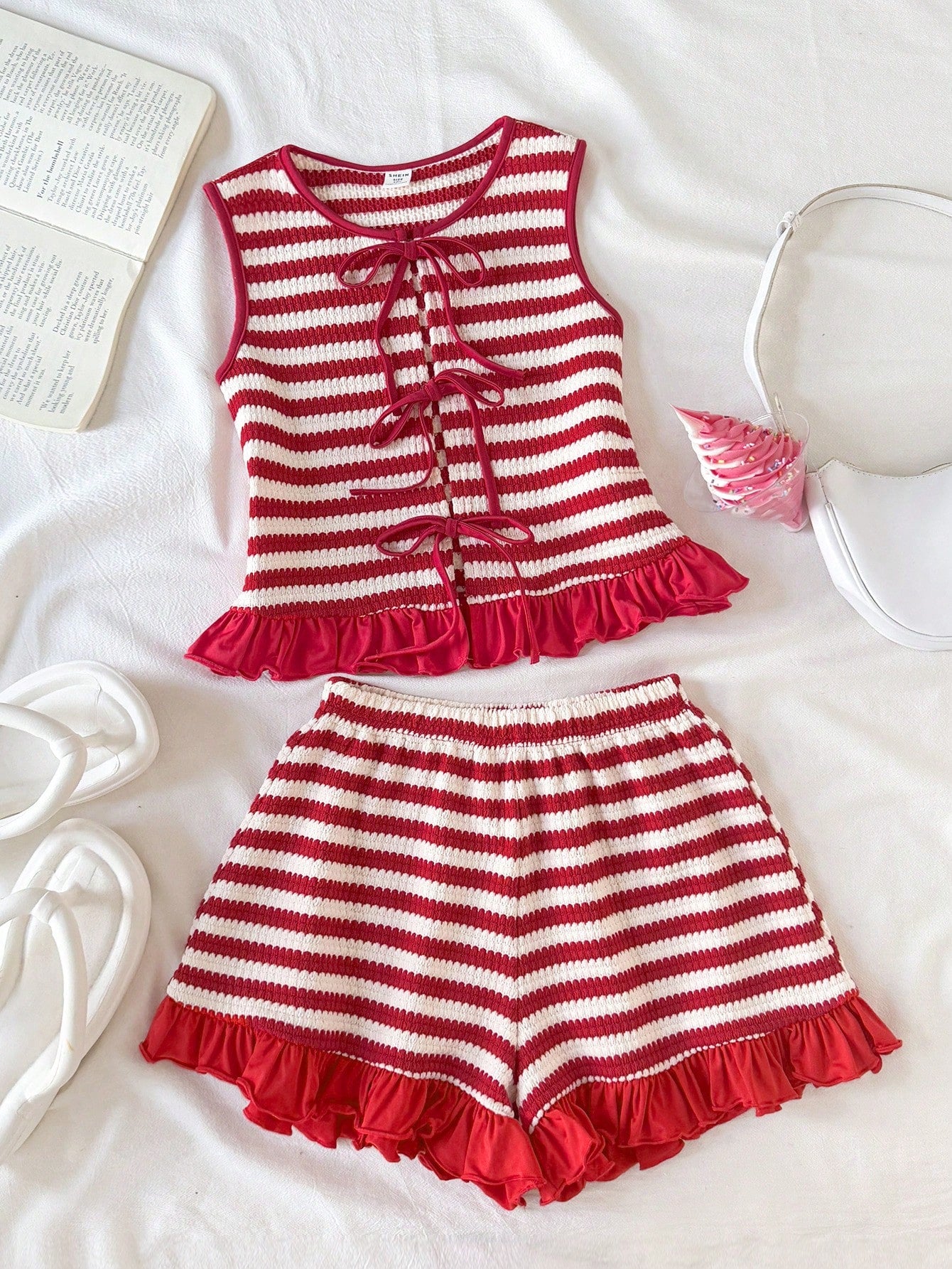 Tween girls casual blue tank top featuring round neck, textured fabric, and bow detail paired with matching shorts set.
