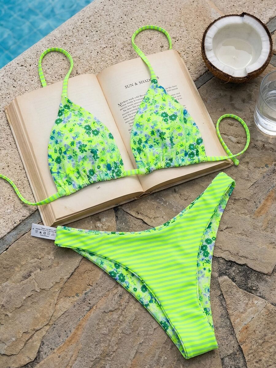 Women's two-piece halter bikini set featuring high cut thong bottoms and removable padding