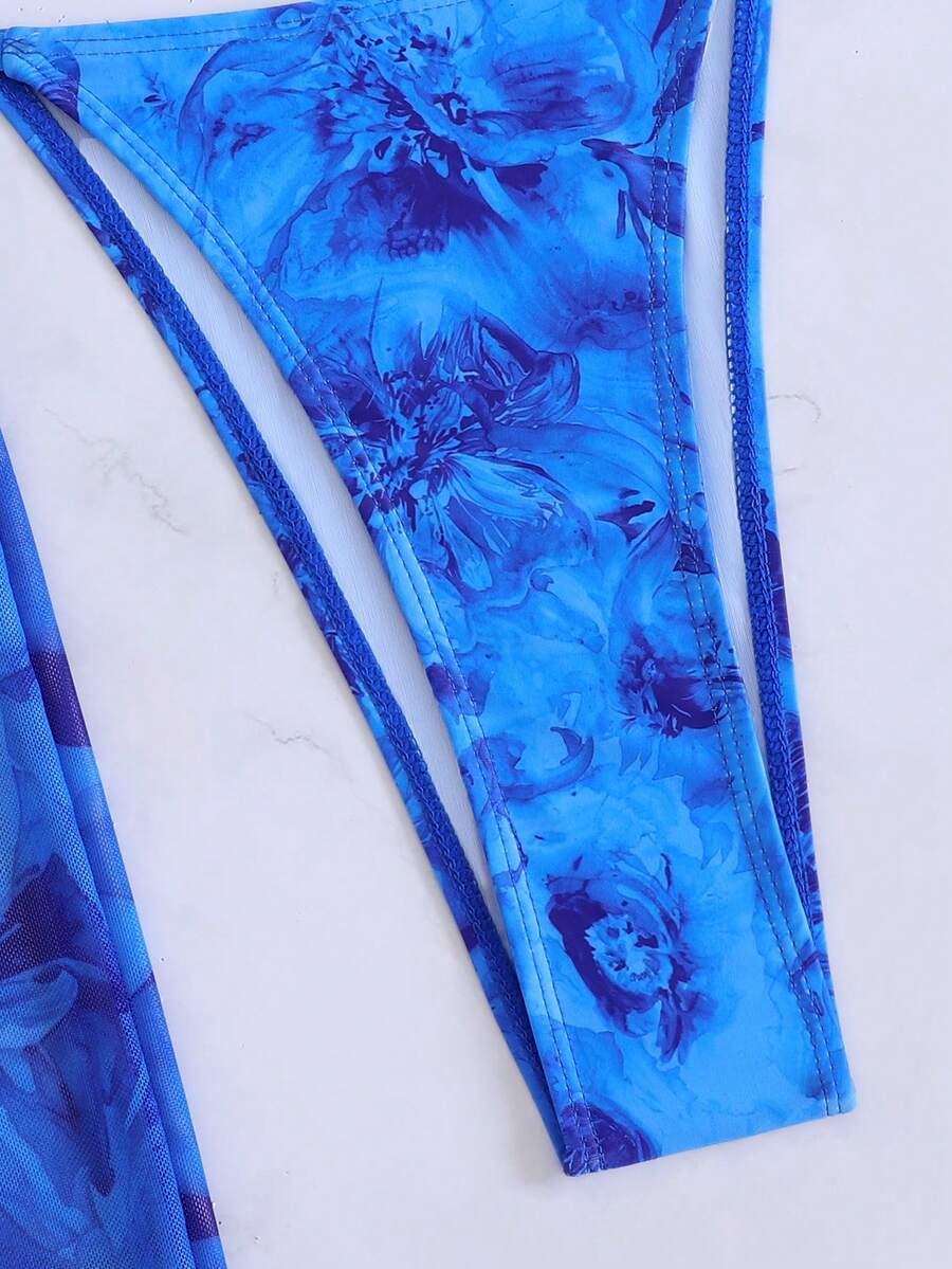 Women's 3-piece floral swimsuit set featuring a multicolor tie-back halter bikini top, low-waist bottoms, and a matching sheer mesh maxi skirt.