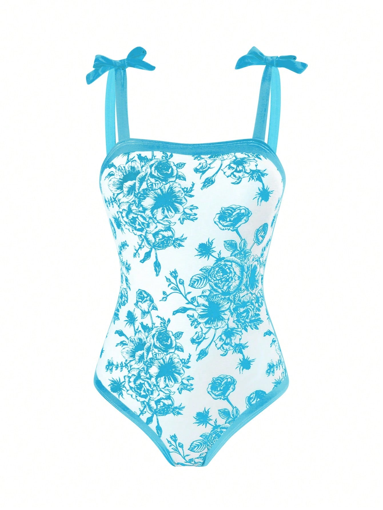 Tween girl black floral one-piece swimsuit set with spaghetti straps, asymmetrical detail, bow decor, and mid-waist bottom for beach, pool, and summer vacation wear.
