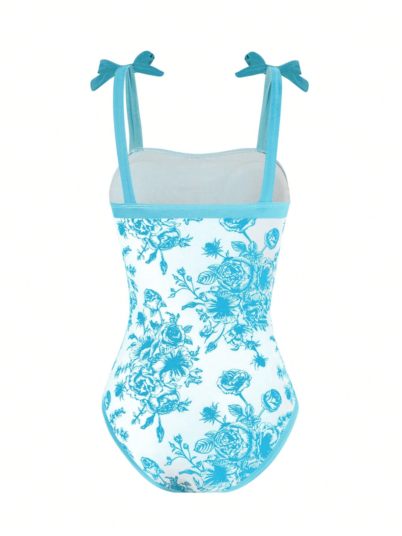 Tween girl black floral one-piece swimsuit set with spaghetti straps, asymmetrical detail, bow decor, and mid-waist bottom for beach, pool, and summer vacation wear.