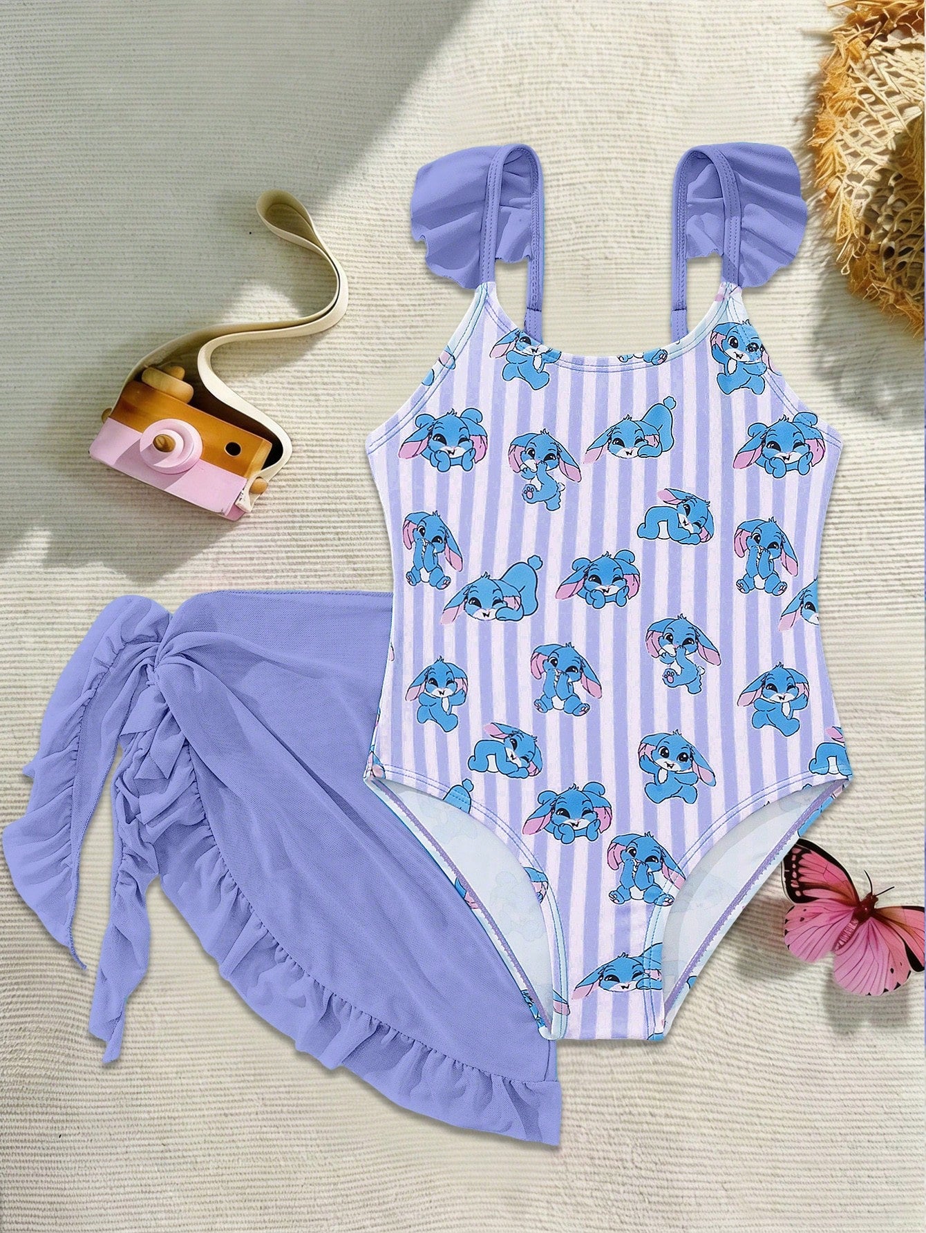 Tween girls one-piece swimsuit in leopard print with ruffle shoulder straps, scoop neckline, fitted shape, and attached ruffle hem skirt; sleeveless, mid-waist skirt bottom, and lined body for swimming, vacation, and summer beach wear.
