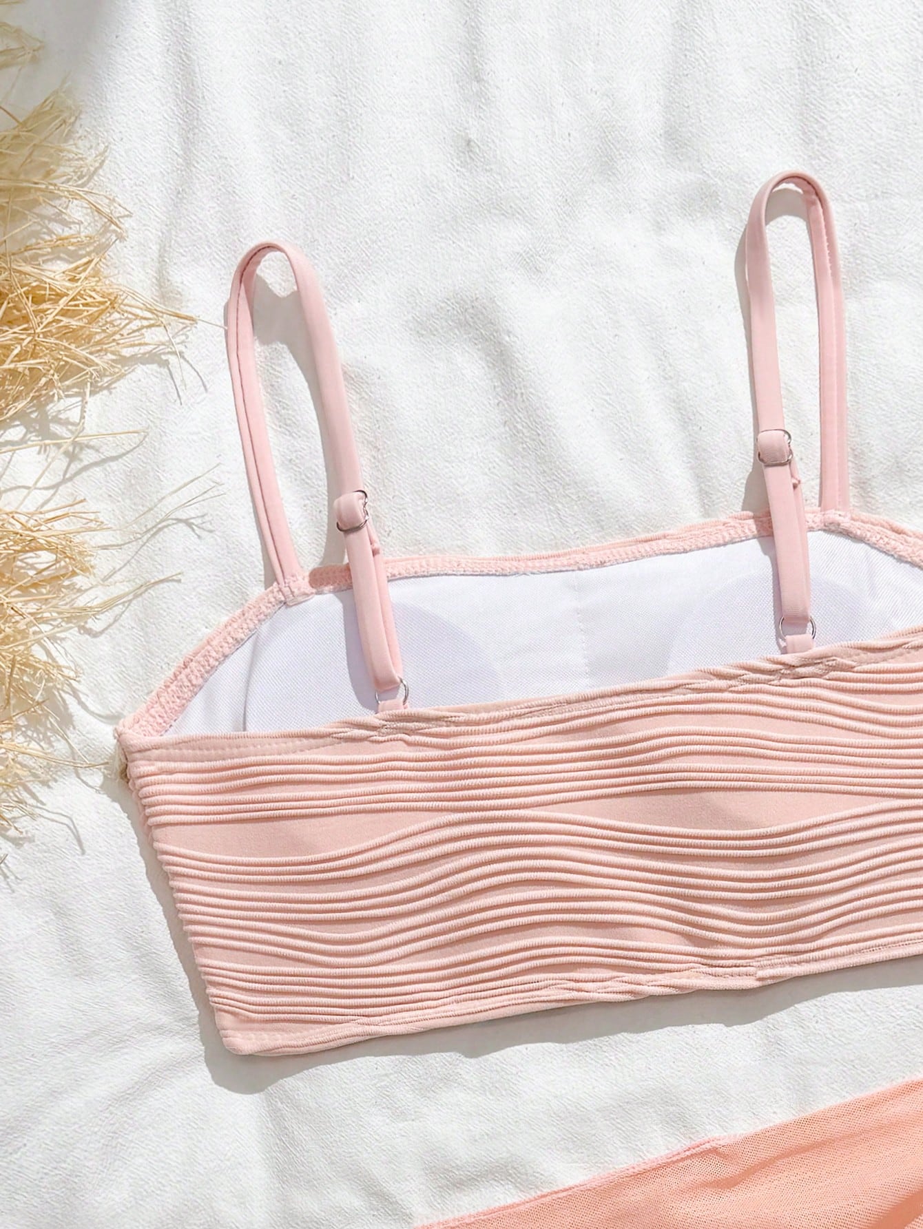 Tween girls bikini set with shell and starfish woven band details, spaghetti strap sleeveless top, and mid-waist skirt-style bottom in blue.