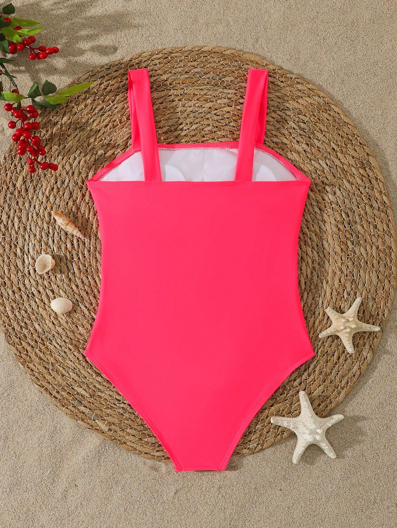 Tween girl multicolor ombre one-piece swimsuit with spaghetti straps, all-over print, lined body, and vacation beachwear style.