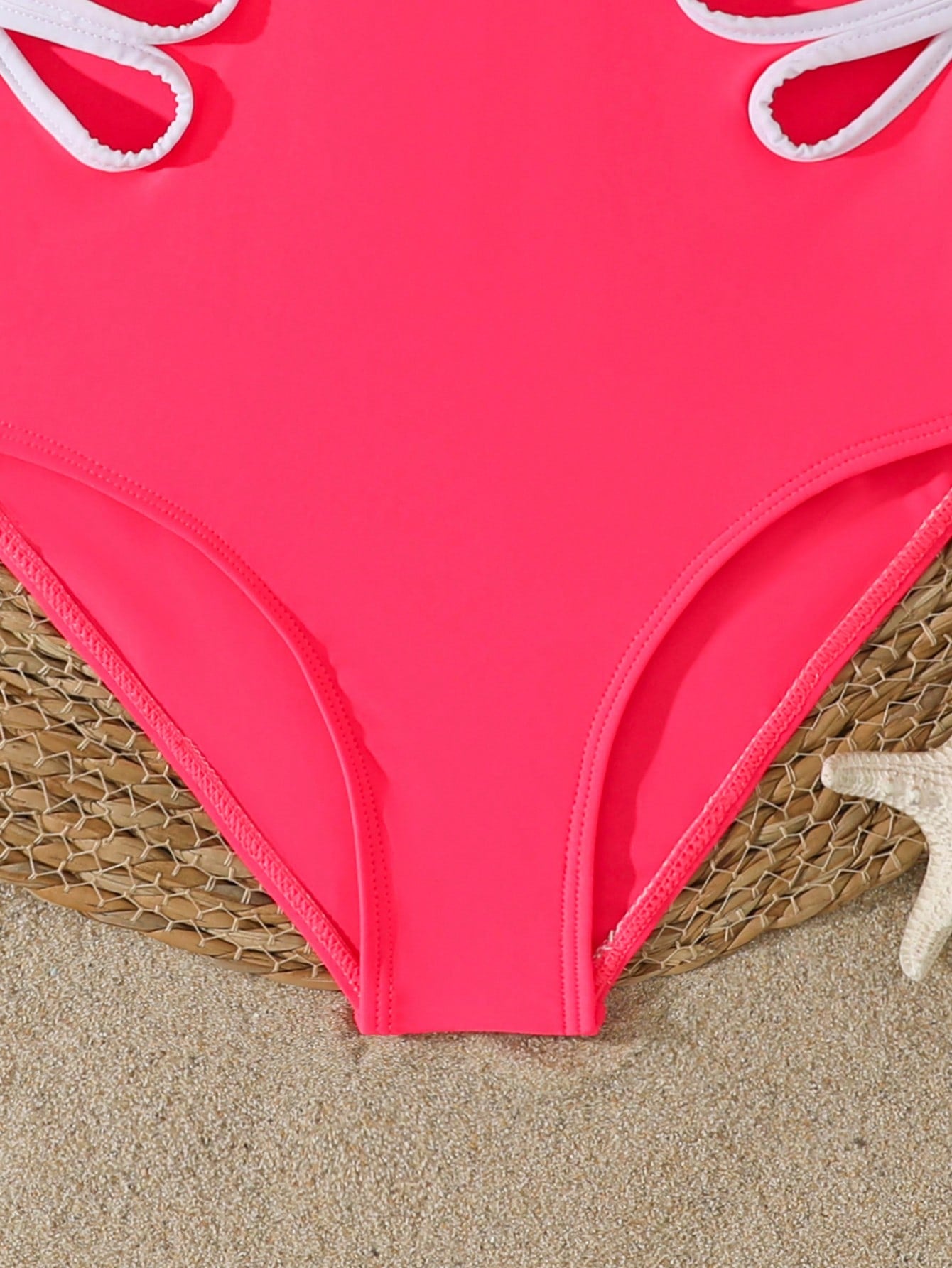 Tween girl multicolor ombre one-piece swimsuit with spaghetti straps, all-over print, lined body, and vacation beachwear style.