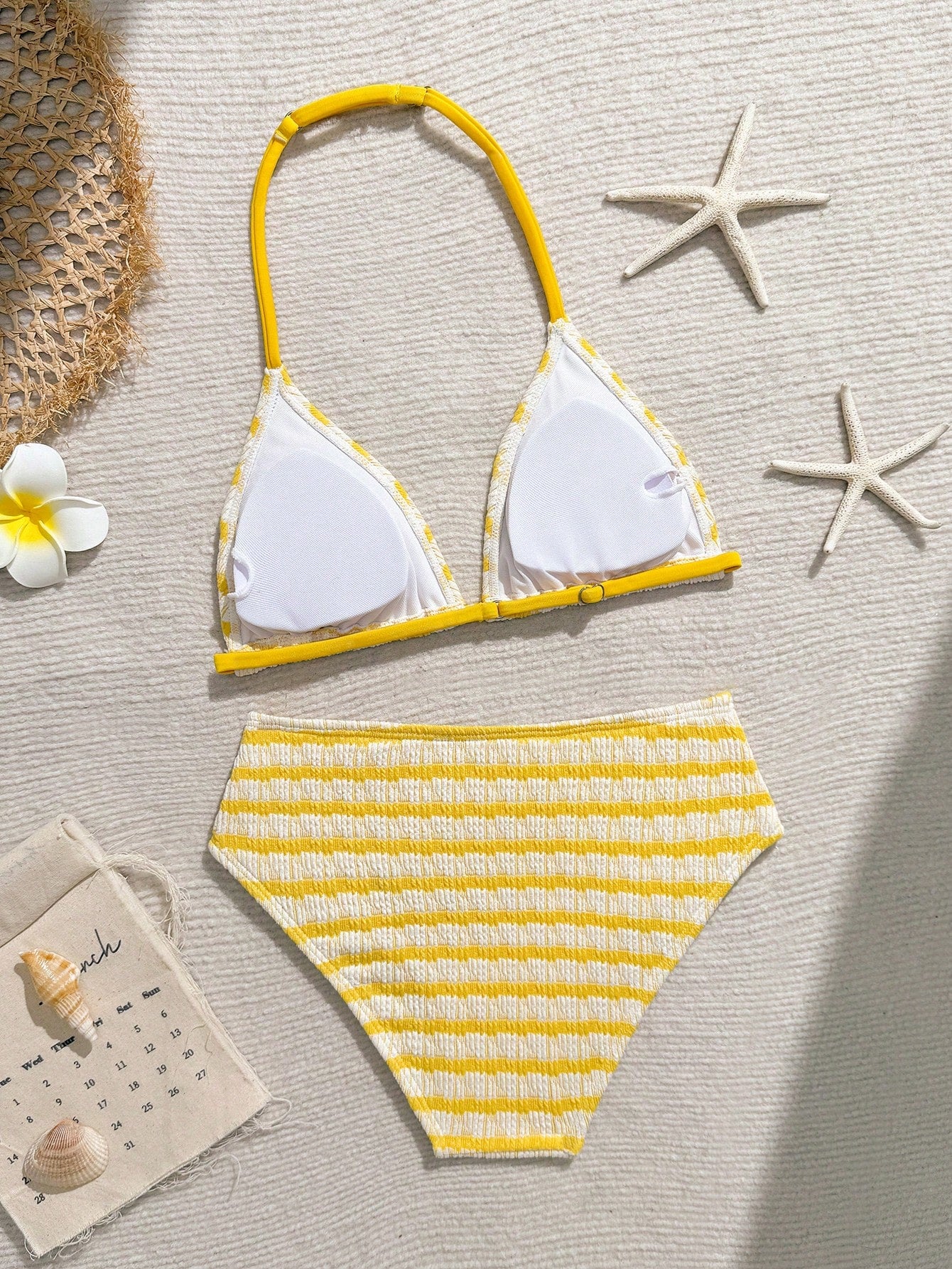 Tween girls blue and white striped two-piece bikini set with halter triangle top and mid-waist short bikini bottoms for beach and vacation swimwear.