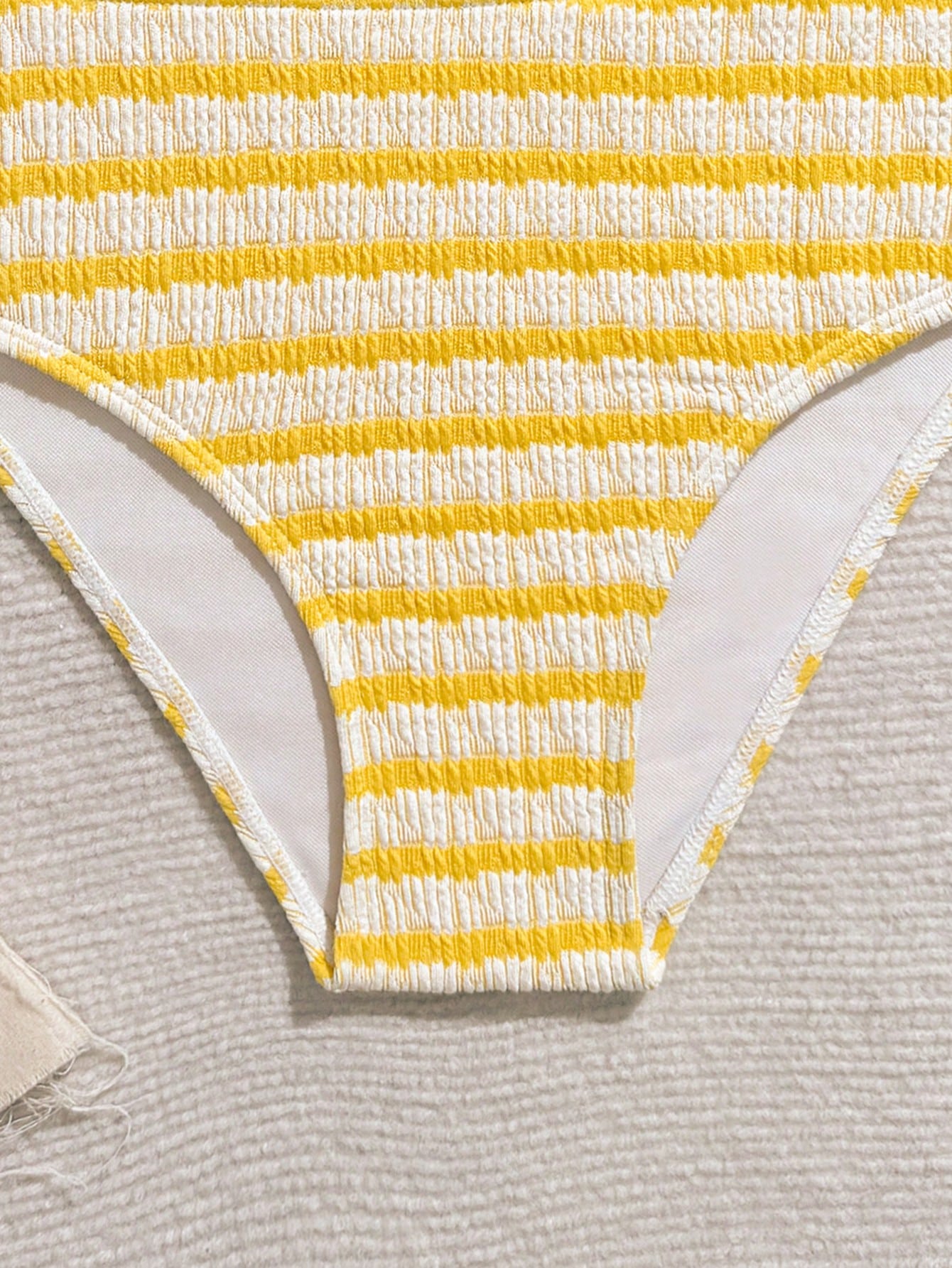 Tween girls blue and white striped two-piece bikini set with halter triangle top and mid-waist short bikini bottoms for beach and vacation swimwear.