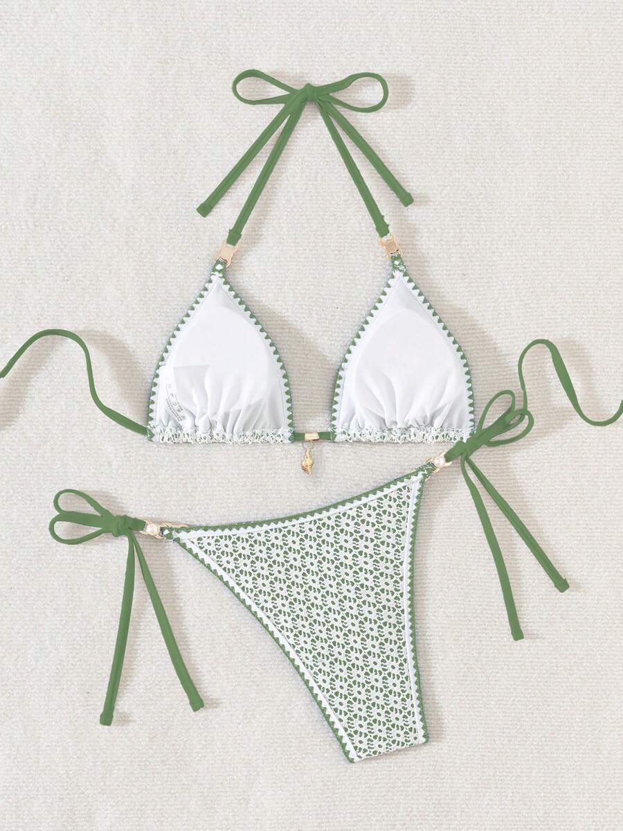 Women's triangle bikini set with contrast lace wireless bra top and ultra high waist tie side bottoms.