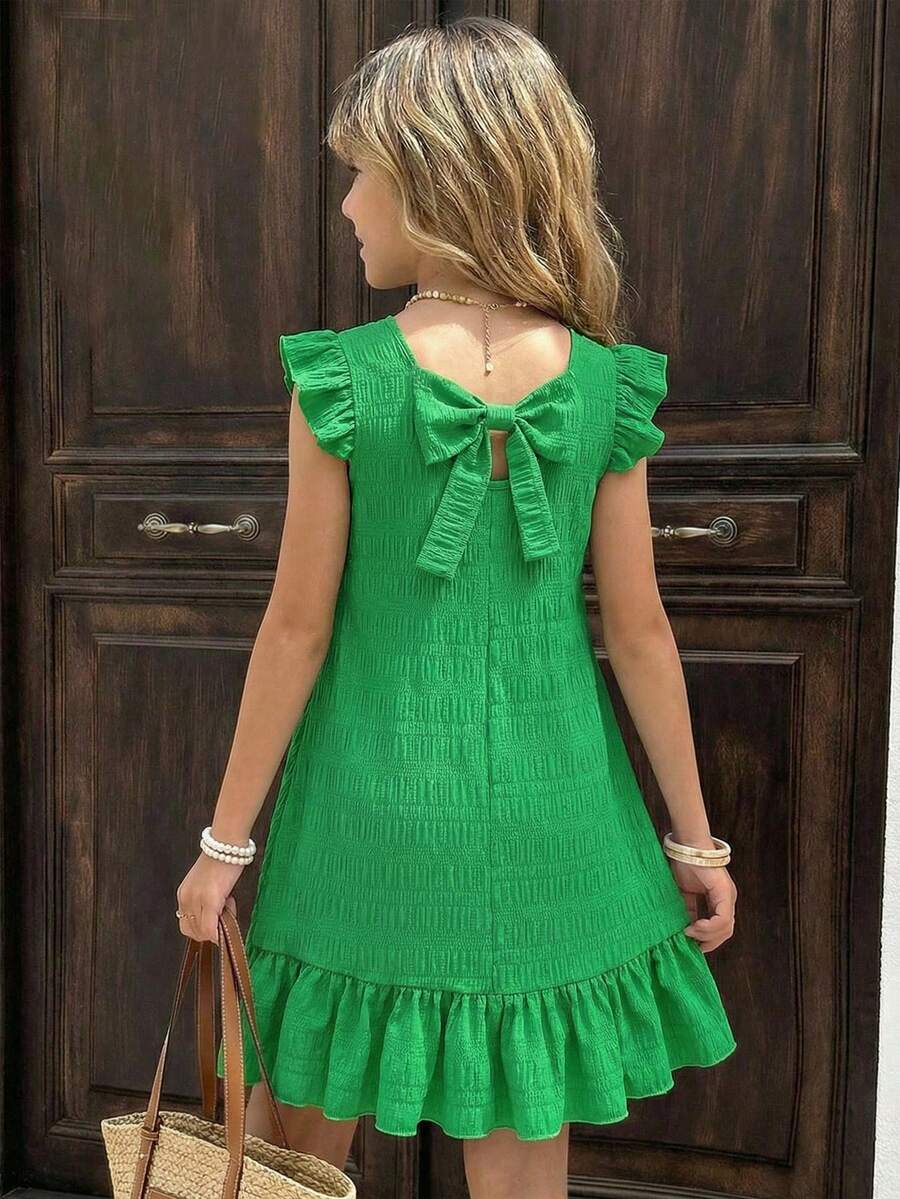 Tween girls apricot vacation midi dress featuring a round neck, cut out details, ruffle flounce accents, and geometric pattern.