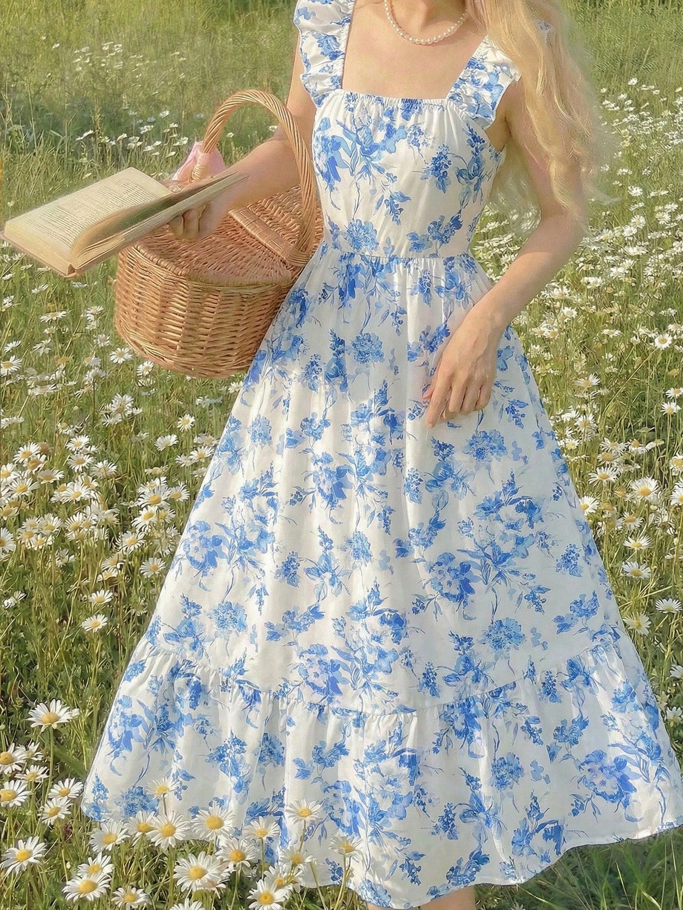 Blue floral print long vacation dress for tween girls featuring an A-line high waist silhouette with ruffle details and spaghetti straps.