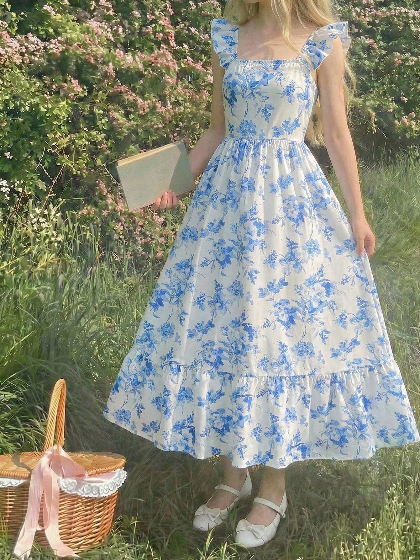 Tween girl multicolor floral vacation dress with square neck, ruffle details, shirred bodice, sleeveless A-line shape, high waist, and flounce hem.