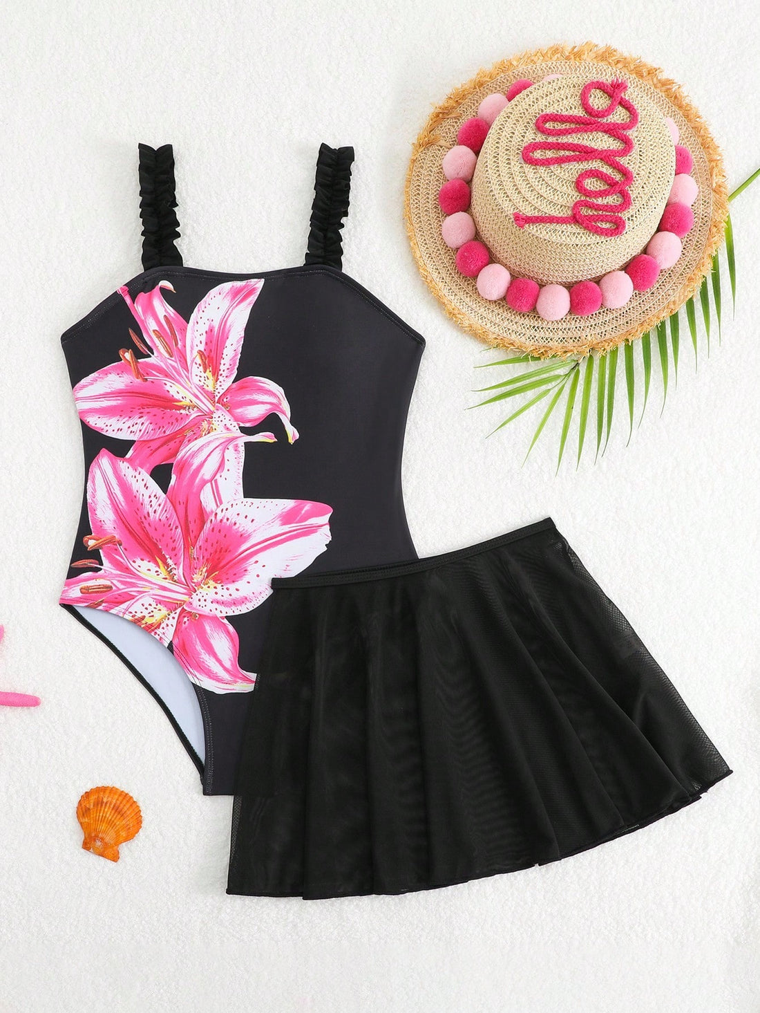 Girls floral print swimsuit set with strap neckline, sleeveless fitted top, and pleated mesh skirt bottom for beach and summer vacation wear.