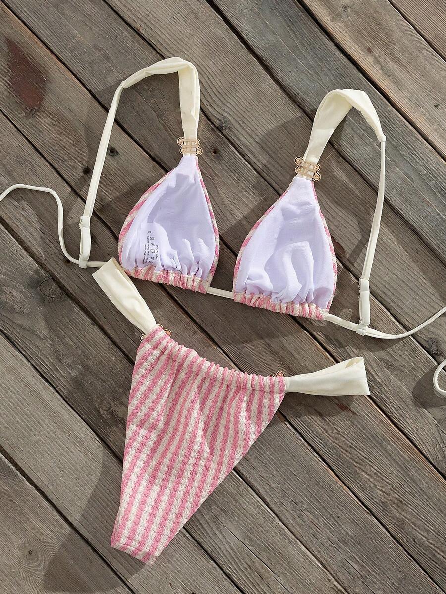Multicolor colorblock bikini set for women featuring a wireless triangle bra top with shoulder straps and ring knot details paired with high waist high cut bottoms.