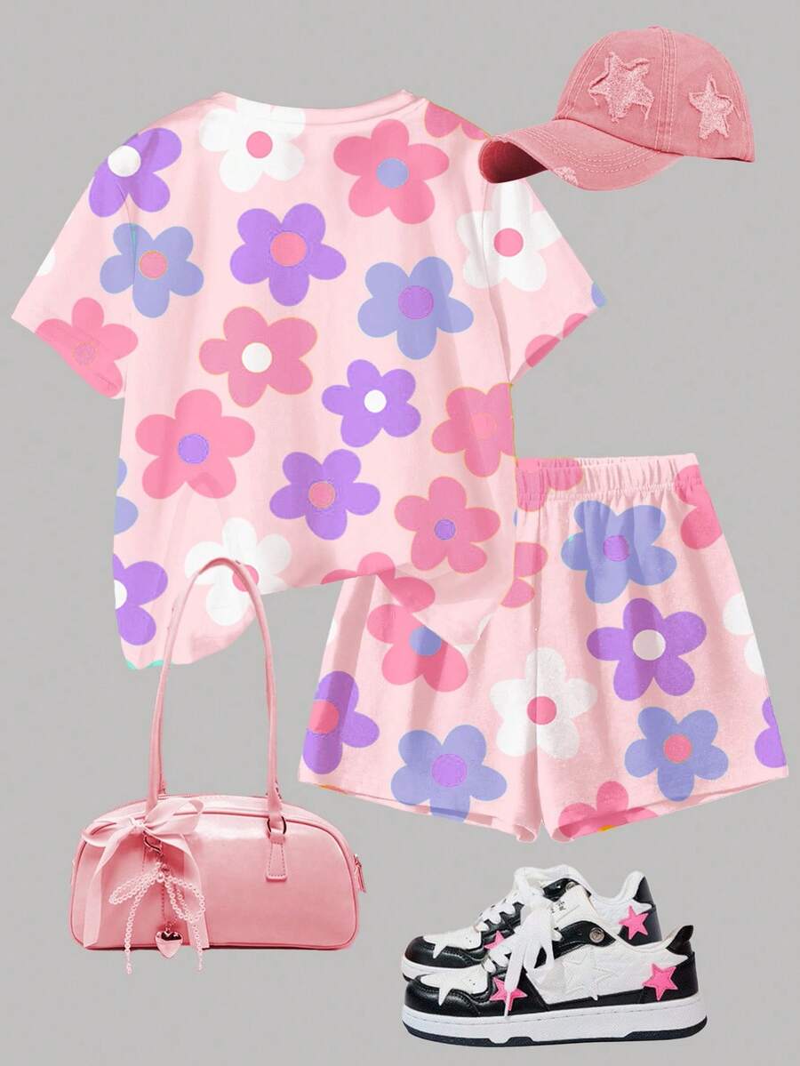 Tween girls multicolor tie-dye 2-piece outfit set featuring a drop-shoulder short-sleeve t-shirt and matching loose track shorts with side pockets.