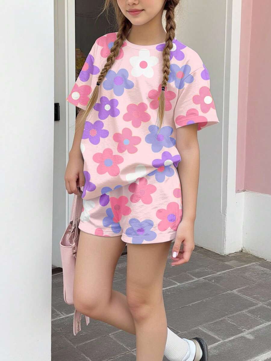 Tween girls multicolor tie-dye 2-piece outfit set featuring a drop-shoulder short-sleeve t-shirt and matching loose track shorts with side pockets.