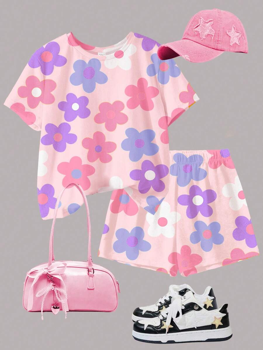 Tween girls multicolor tie-dye 2-piece outfit set featuring a drop-shoulder short-sleeve t-shirt and matching loose track shorts with side pockets.