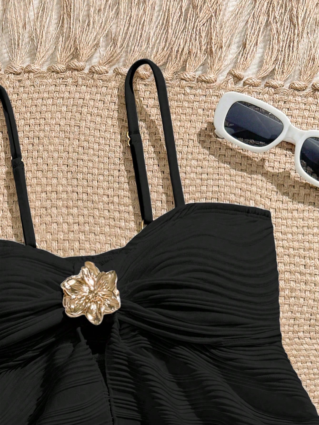Tween girls two-piece tankini swimwear set with spaghetti straps, asymmetrical design, and 3D rose detail. Features a plant-pattern top and mid-waist bottoms in stretchy fabric for beach or pool wear.