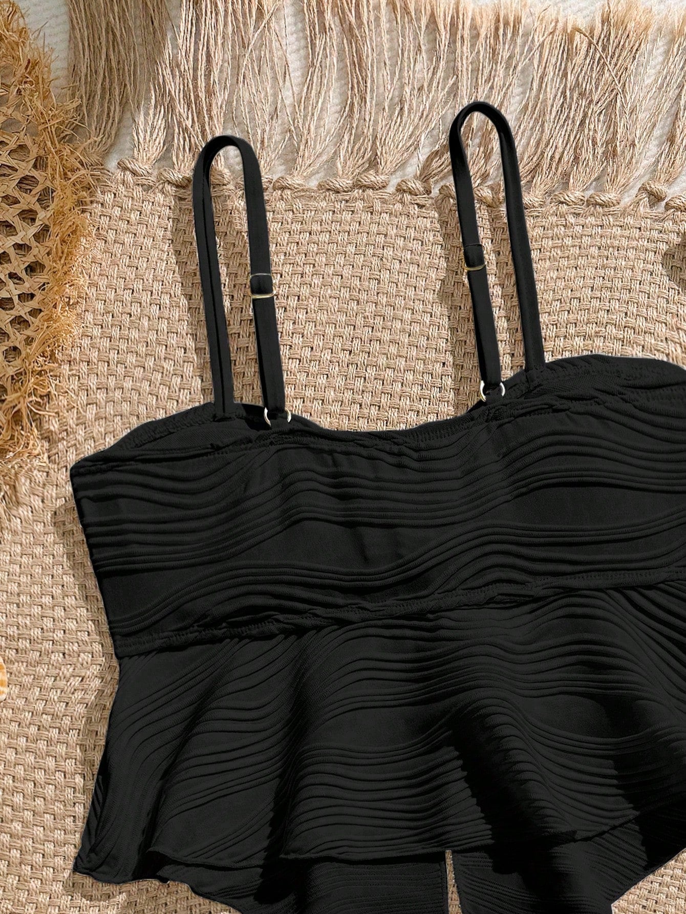 Tween girls 2-piece tankini swimwear set in apricot with a textured jacquard look, asymmetrical spaghetti-strap sleeveless top, and matching mid-waist short bikini bottoms.