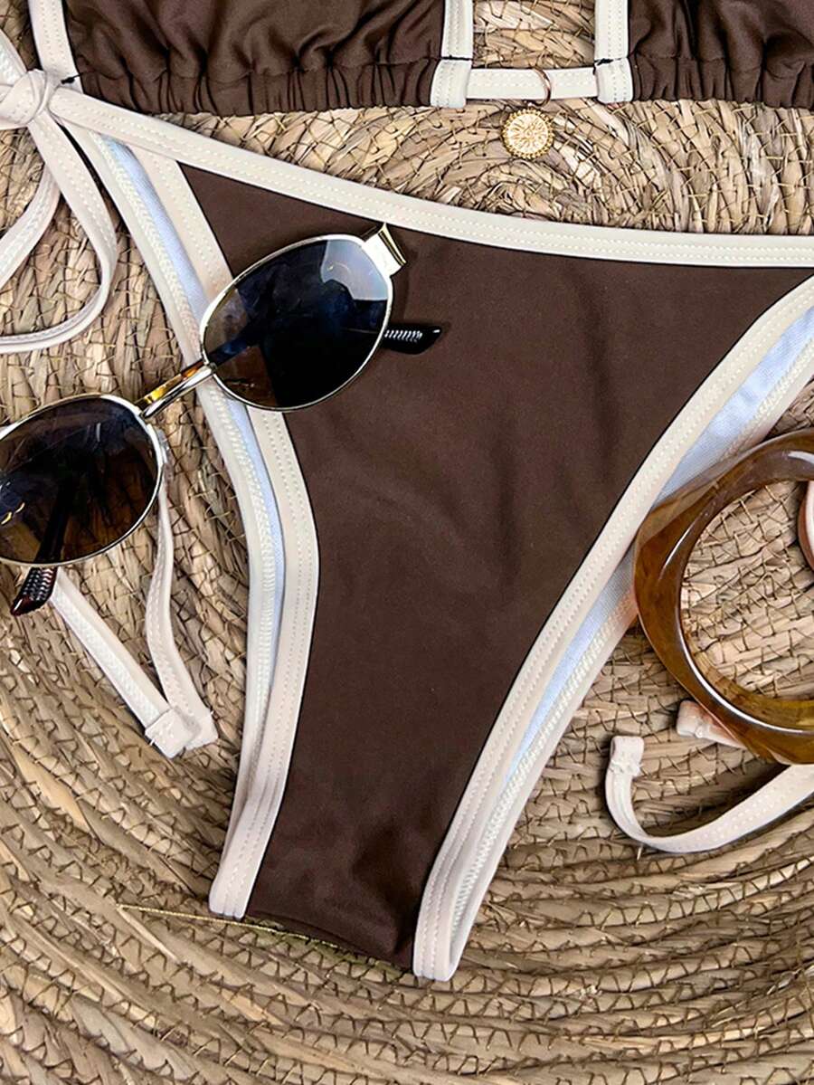 Women's high waist 2-piece triangle bikini set featuring colorblock trim, halter neckline, wireless bra with removable padding, and tie-side bottoms.