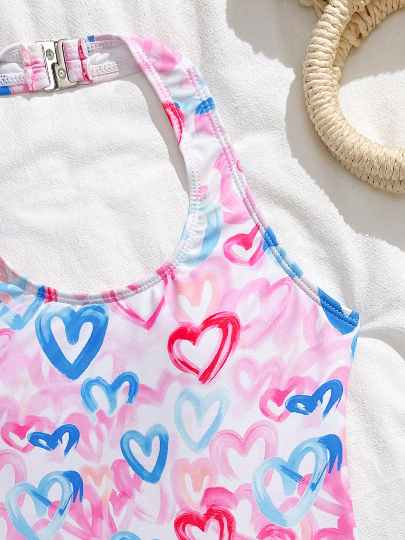 Girls 2-piece swimwear set featuring a butterfly print halter swimsuit top with contrast piping and separate mid-waist shorts; sleeveless, high-stretch, wireless design for beach and vacation wear.