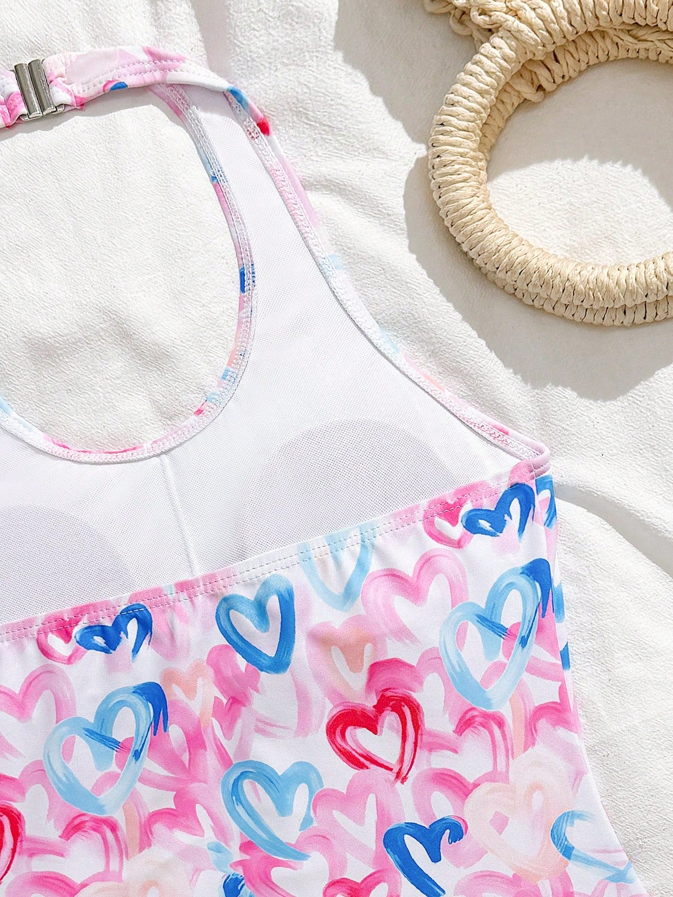Girls 2-piece swimwear set featuring a butterfly print halter swimsuit top with contrast piping and separate mid-waist shorts; sleeveless, high-stretch, wireless design for beach and vacation wear.