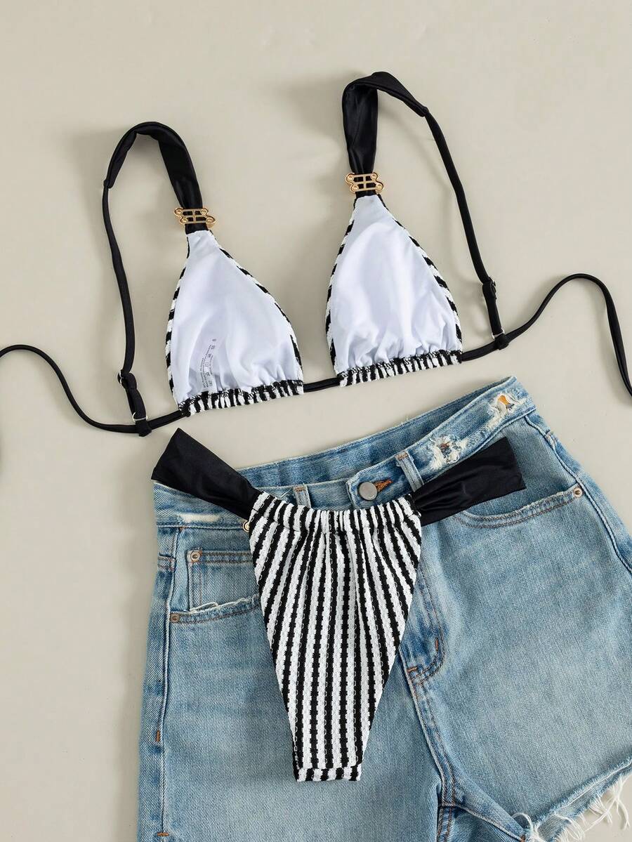 Multicolor colorblock bikini set for women featuring a wireless triangle bra top with shoulder straps and ring knot details paired with high waist high cut bottoms.