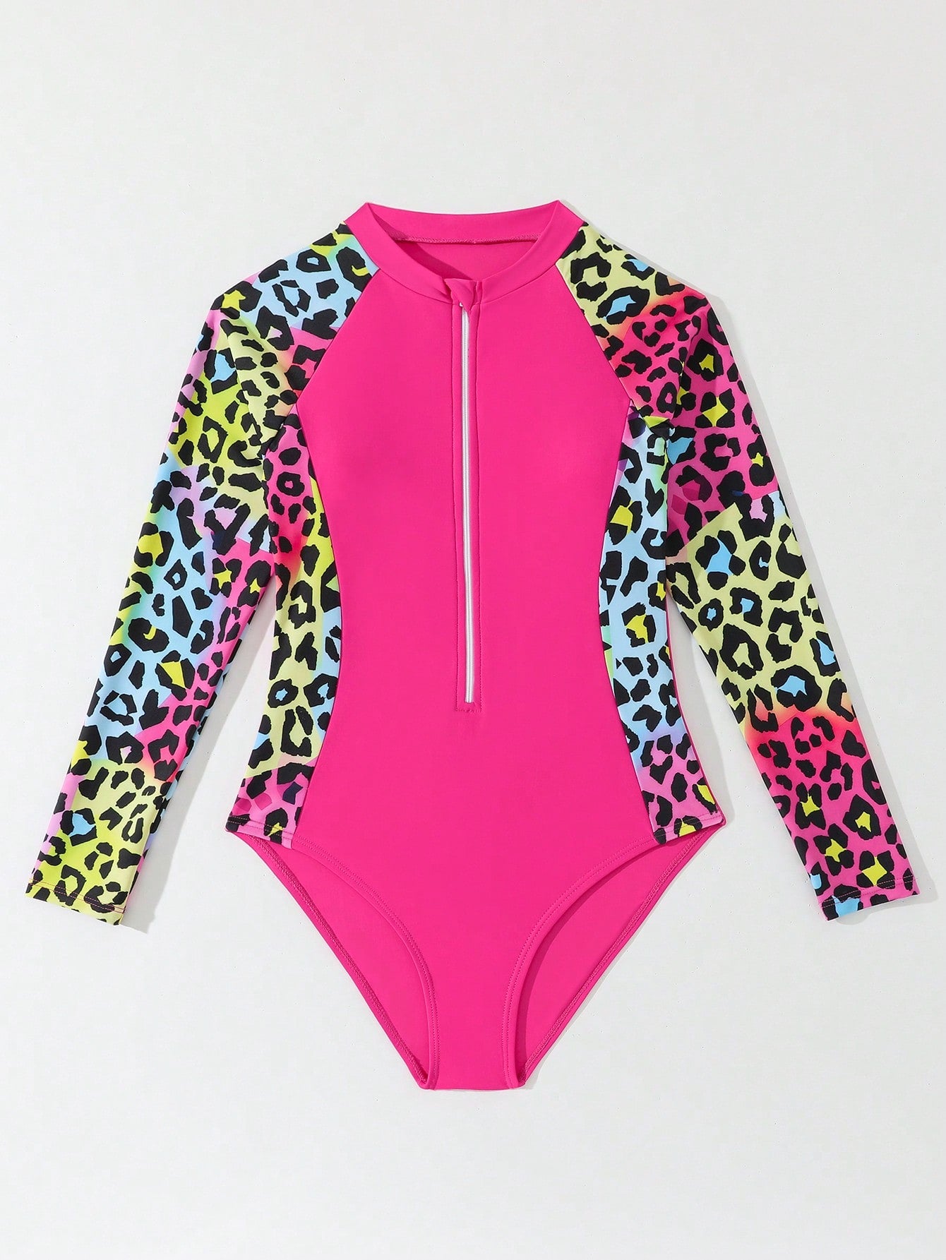 Girls one-piece swimsuit in blue with all-over leopard leaf print, ruffle detail, zipper front, high neck, and lined body for swimming and vacation.