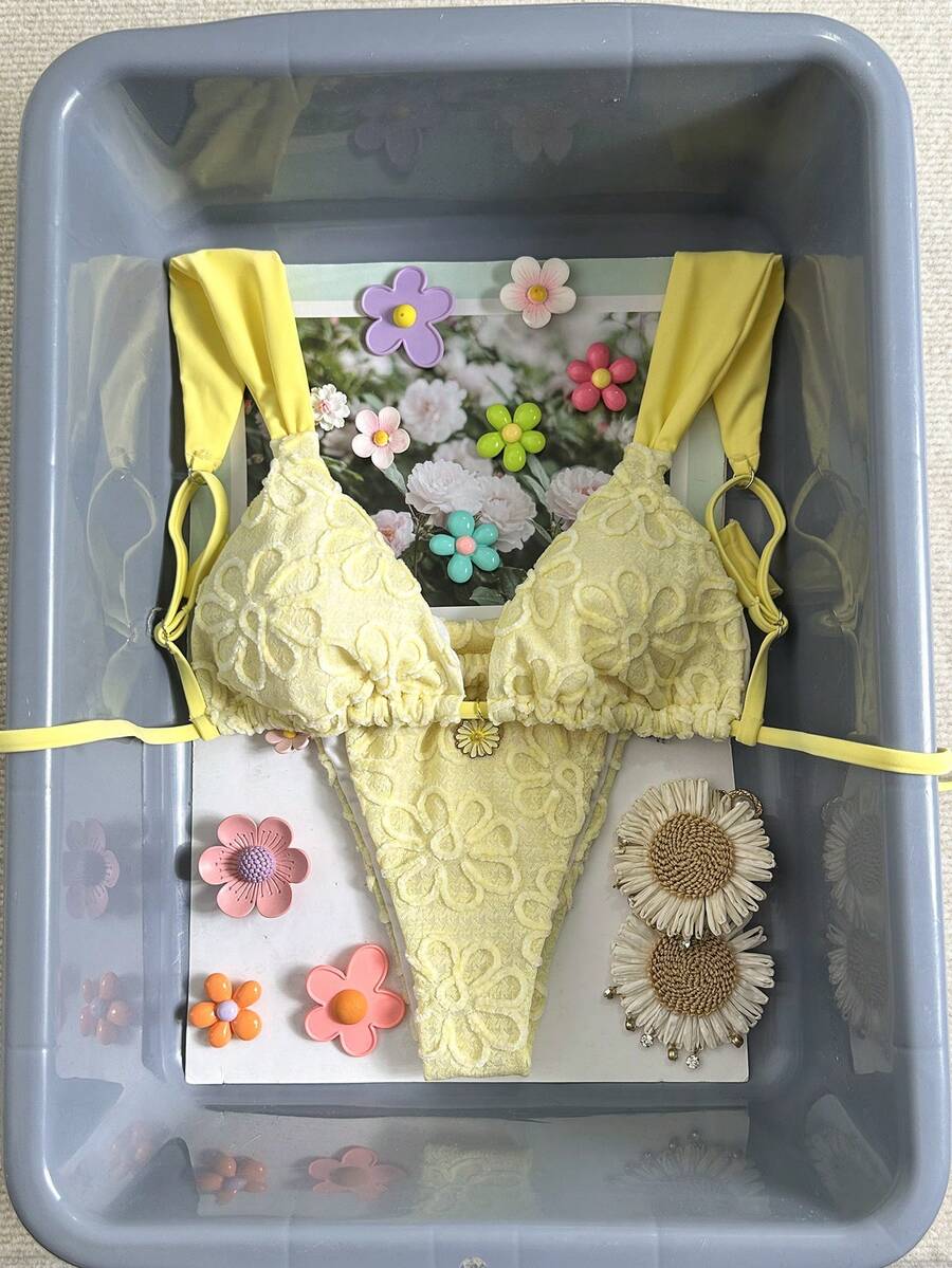 Women's 2-piece triangle cup bikini set in solid color featuring woven pearl shell decoration, halter neckline, and high-waist side-tie ruched bottoms.