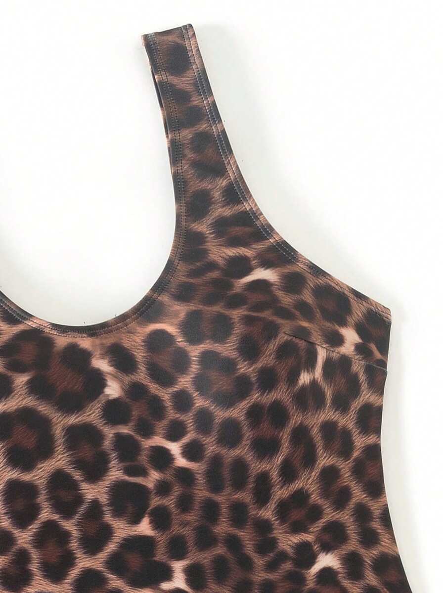 Women's solid color one-piece swimsuit featuring a backless scoop neck design and high cut fit