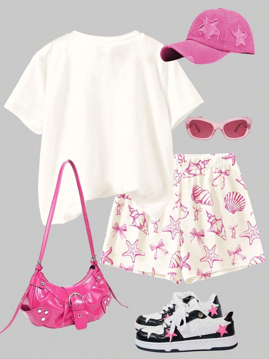 Tween girls 2-piece summer casual outfit featuring a multicolor seashell print short sleeve T-shirt with drop shoulders and matching loose fit shorts with pockets.