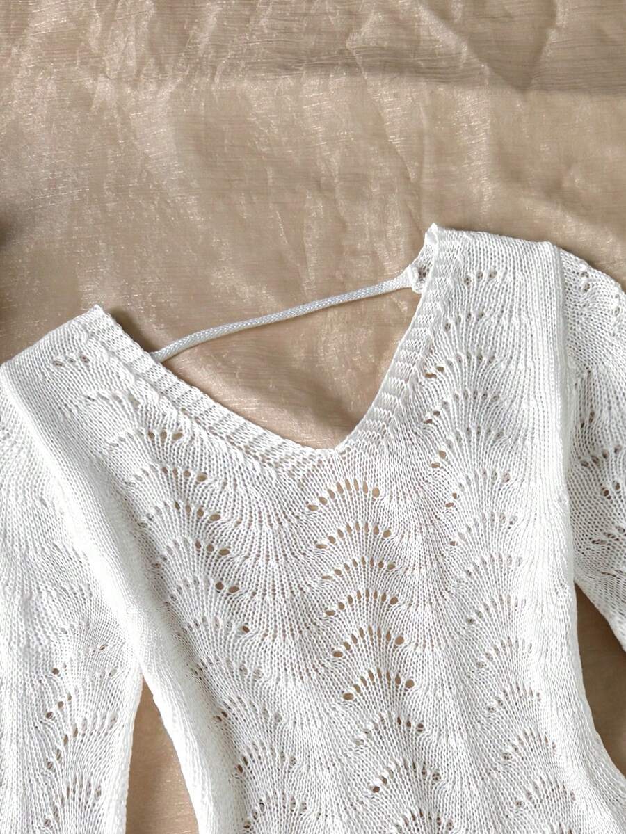 Girls semi-sheer beach cover-up dress with V-neckline, long sleeves, backless side-tie design, and asymmetrical hem for tween summer beach vacations.