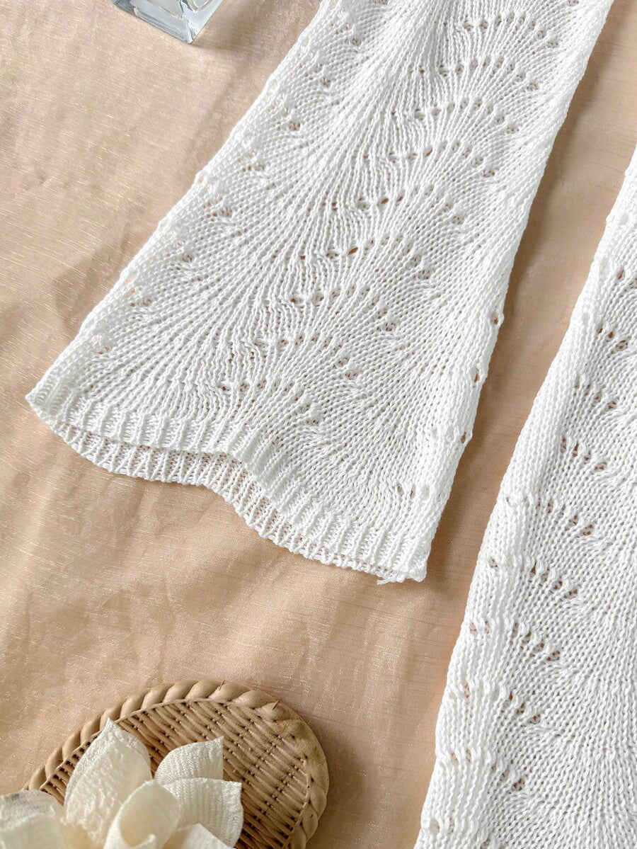 Girls semi-sheer beach cover-up dress with V-neckline, long sleeves, backless side-tie design, and asymmetrical hem for tween summer beach vacations.