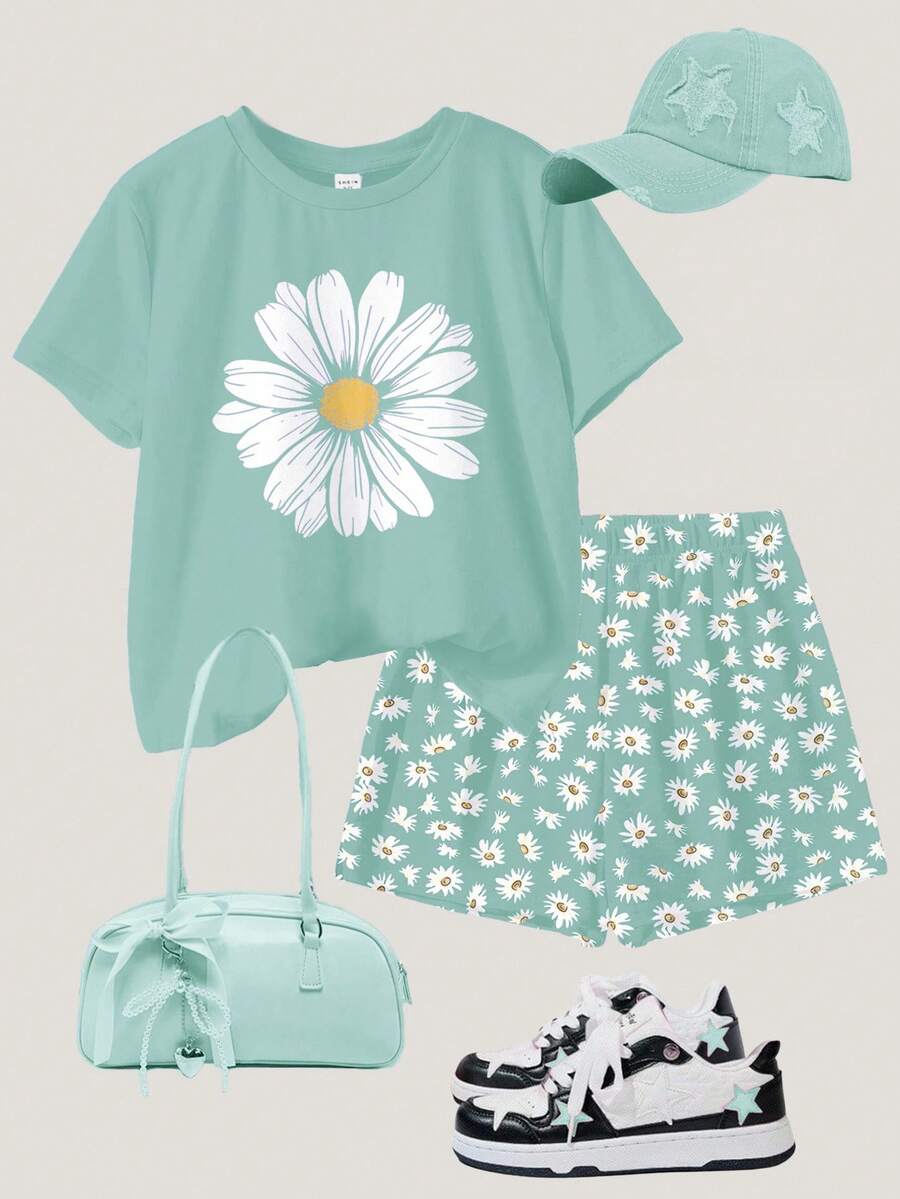 Tween girls 2-piece summer casual outfit featuring a multicolor seashell print short sleeve T-shirt with drop shoulders and matching loose fit shorts with pockets.
