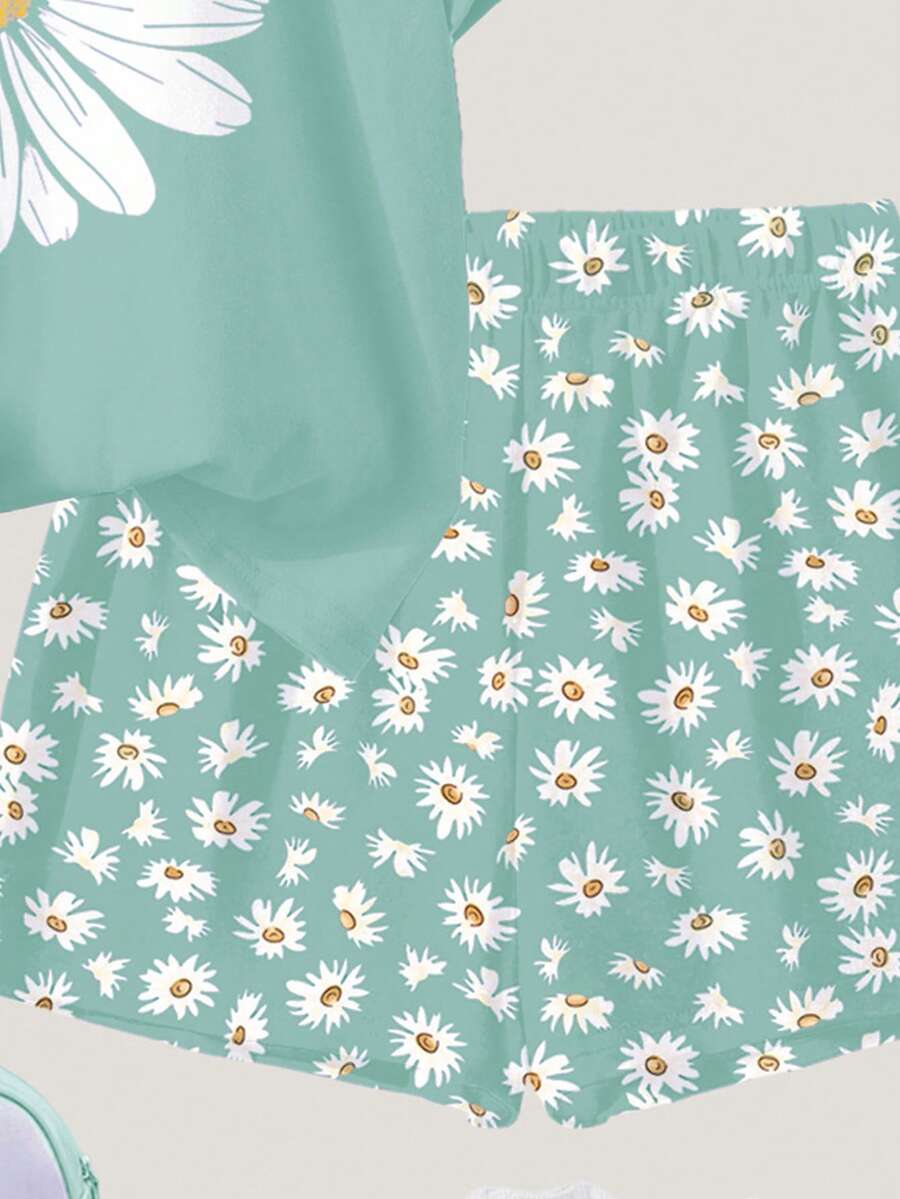Tween girls 2-piece summer casual outfit featuring a multicolor seashell print short sleeve T-shirt with drop shoulders and matching loose fit shorts with pockets.